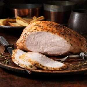 sliced turkey plated on a table